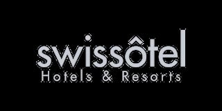 Swissotel Hotels and Resorts logo featuring white text on black background with a mountain peak icon