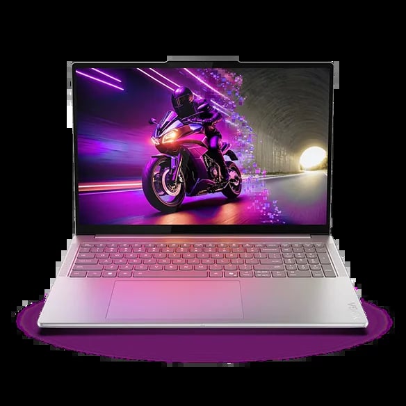 Pink laptop displaying vibrant neon artwork of a glowing motorcycle with purple and orange lighting effects on screen