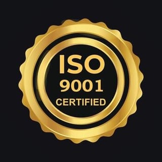 ISO 9001 certified gold badge seal with scalloped edges on dark background