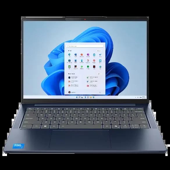 Open laptop displaying Windows 11 start menu with blue abstract background wallpaper on screen