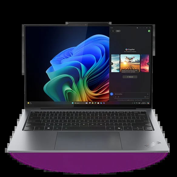 Lenovo ThinkPad laptop displaying colorful abstract wallpaper with Windows 11 interface and image editing software open
